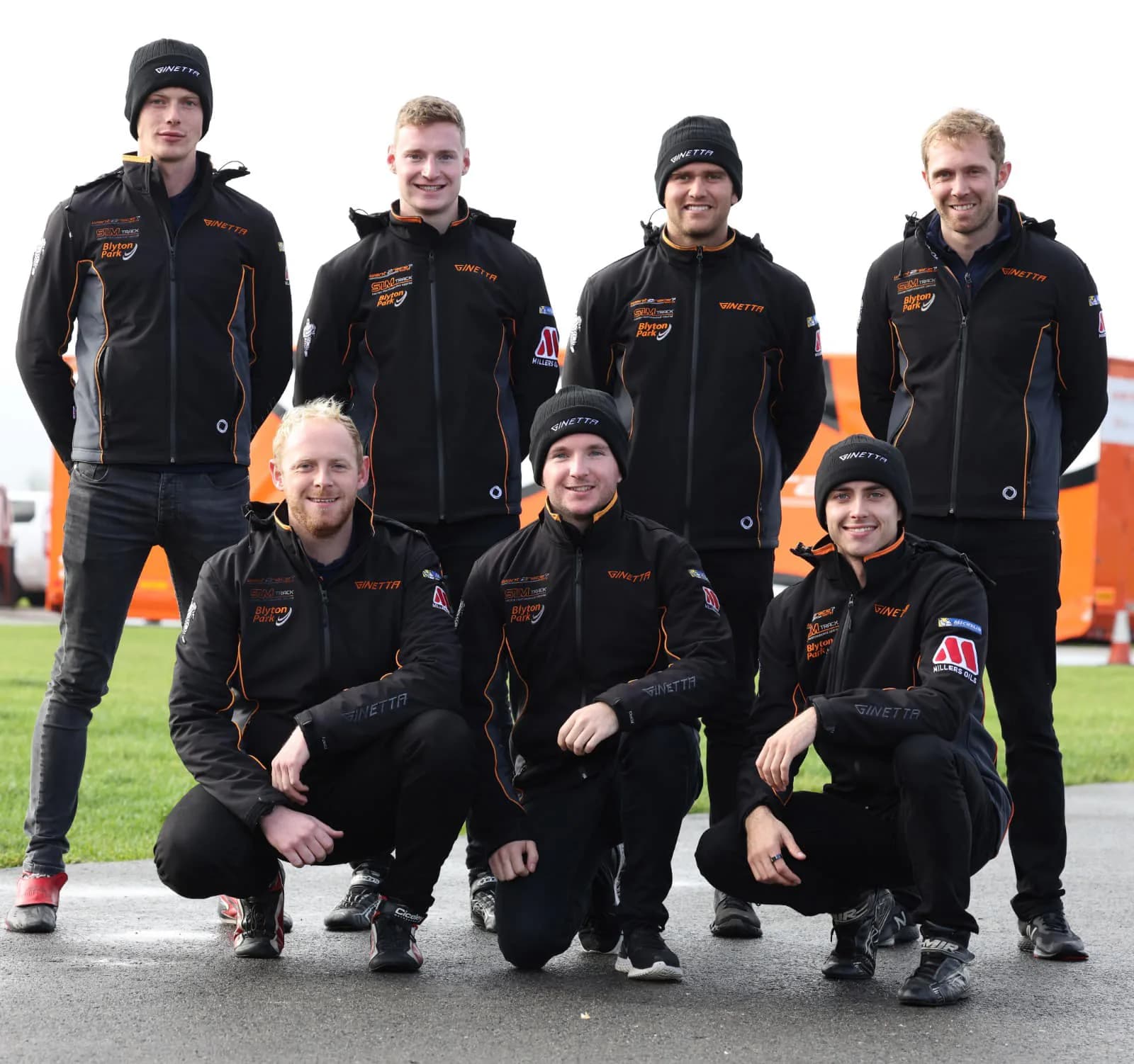 A coordinated Torq team wearing custom garments, used as temporary Sportswear photography.